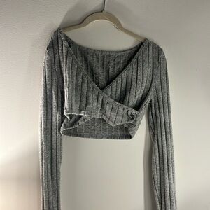 Cropped cross neck sweater